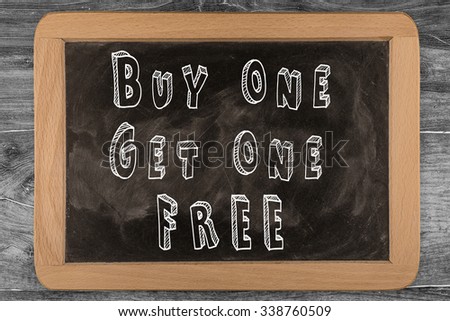 Buy One Get One FREE - chalkboard with outlined text - on wood