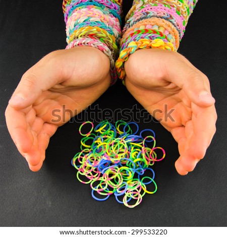Colorful rubber bracelets on your wrist.