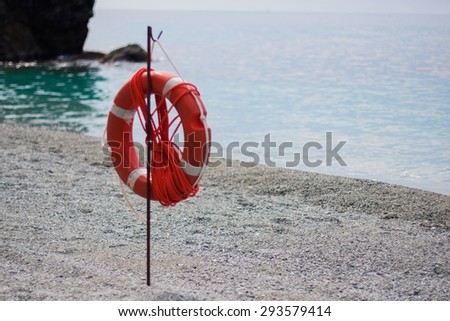 red life buoy on the beach of Cinque terre in Italy