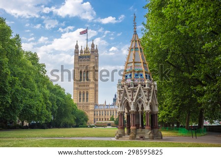 Victoria Tower (Houses of Parliament) and Buxton Memorial Fountain shot from Victoria Tower Gardens, London, UK
