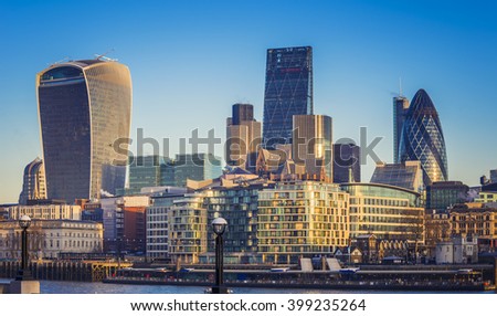 London, England - Bank. The world famous business district of London with skyscrapers and clear blue sky