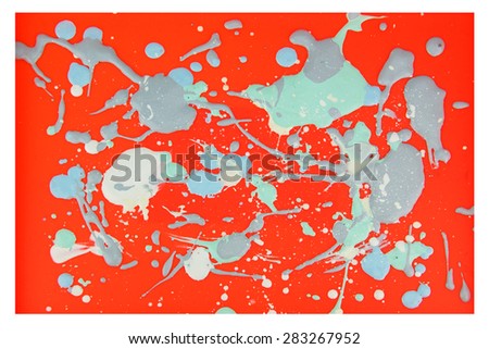 Orange background with drops of various colors overlap.