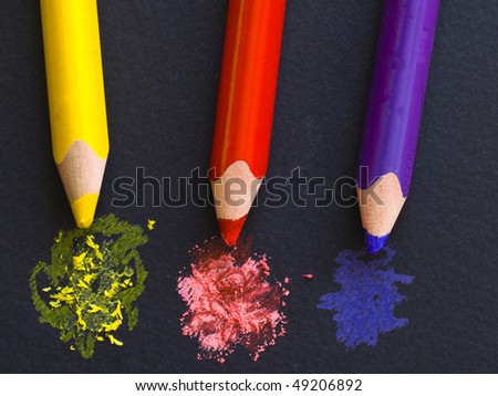 yellow, red and violet pencils