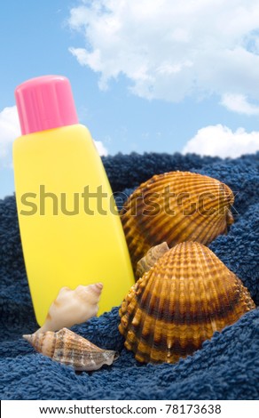 summer cosmetic with shells, holiday concept
