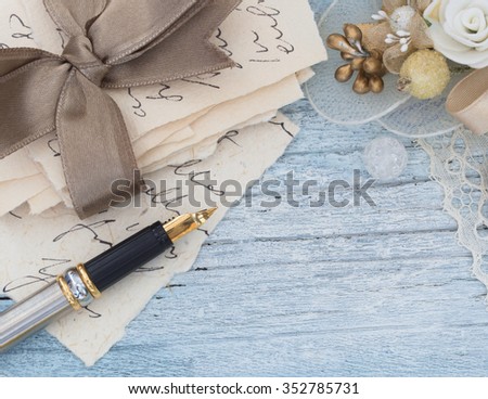 old letters and pen in the vintage arrangement