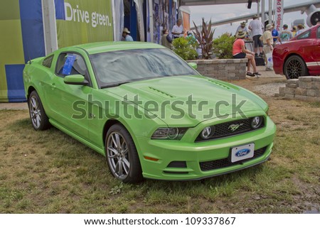 OSHKOSH, WI - JULY 27: A 2012 Green Ford Mustang car on display at the Ford exhibit at the 2012 AirVenture at EAA on July 27, 2012 in Oshkosh, Wisconsin.