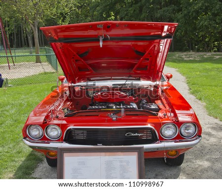 COMBINED LOCKS, WI - AUGUST 18: Engine of an orange Dodge Challenger classic car at the 2nd Annual Horizon of Hope Generations Car and Truck Show on August 18, 2012 in Combined Locks, Wisconsin.
