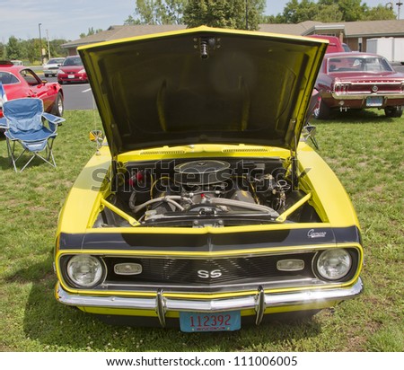 COMBINED LOCKS, WI - AUGUST 18: Front view of a yellow 1968 Chevy Camaro classic car at the 2nd Annual Horizon of Hope Generations Car and Truck Show on August 18, 2012 in Combined Locks, Wisconsin.