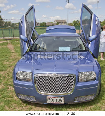 COMBINED LOCKS, WI - AUGUST 18: 2007 Chrysler 300 car with butterfly doors at the 2nd Annual Horizon of Hope Generations Car and Truck Show on August 18, 2012 in Combined Locks, Wisconsin.