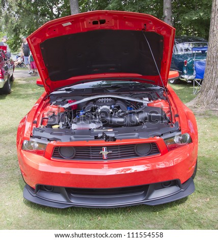 WAUPACA, WI - AUGUST 25: Front view of 2012 Ford Mustang Boss 302 car at the 10th Annual Waupaca Rod & Classic Car Club Car Show on August 25, 2012 in Waupaca, Wisconsin.