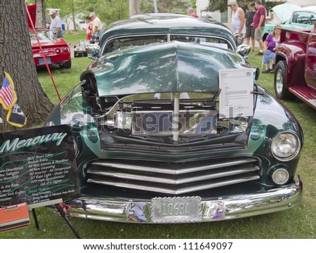 WAUPACA, WI - AUGUST 25: Front view of a 1949 Mercury Coupe car at the 10th Annual Waupaca Rod & Classic Car Club Car Show on August 25, 2012 in Waupaca, Wisconsin.