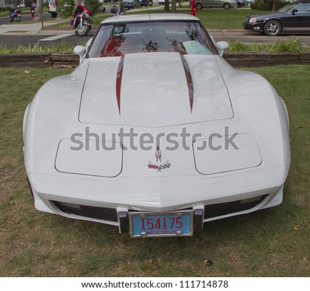WAUPACA, WI - AUGUST 25: Front view of a White 1977 Chevy Corvette car at the 10th Annual Waupaca Rod & Classic Car Club Car Show on August 25, 2012 in Waupaca, Wisconsin.