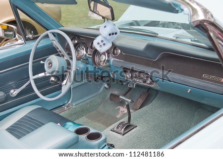 WAUPACA, WI - AUGUST 25: Interior view of 1967 Aqua Blue Ford Mustang car at the 10th Annual Waupaca Rod & Classic Car Club Car Show on August 25, 2012 in Waupaca, Wisconsin.