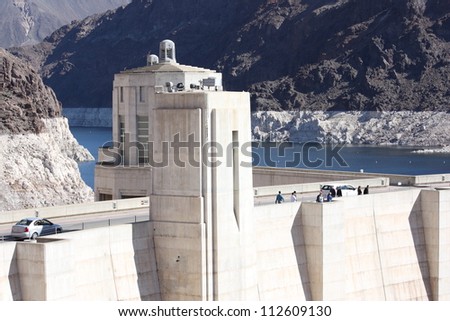 BOULDER CITY, NV - MARCH 4: A crowd watches on top Hoover Dam to look at construction of Mike O\'Callaghan - Pat Tillman Memorial Bridge as it nears completion on March 4, 2010 in Boulder City, Nevada.