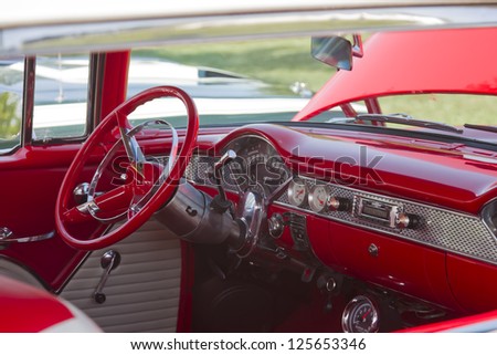 MARION, WI - SEPTEMBER 16: Interior of Red and white Chevy Bel Air car at the 3rd Annual Not Just Another Car Show on September 16, 2012 in Marion, Wisconsin.