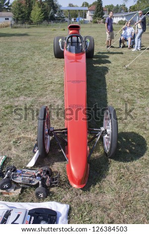 MARION, WI - SEPTEMBER 16: Low view of a red drag racing car at the 3rd Annual Not Just Another Car Show on September 16, 2012 in Marion, Wisconsin.