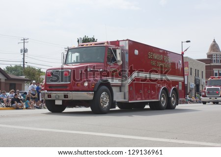 SEYMOUR, WI - AUGUST 4:  Side View of Seymour Rural Fire Department Tanker 1 Truck at the Annual Hamburger Festival Parade on August 4, 2012 in Seymour, Wisconsin.