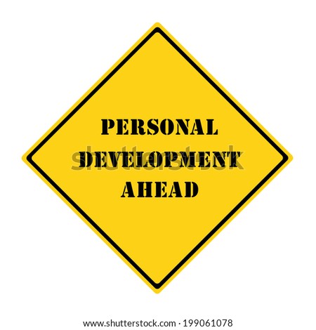 A yellow and black diamond shaped road sign with the words PERSONAL DEVELOPMENT AHEAD making a great concept.