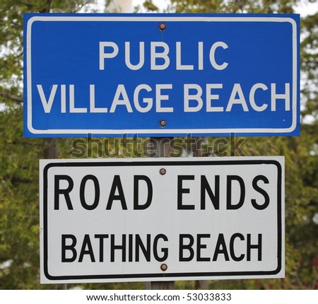 A sign for a Public bathing beach on Lake Michigan\'s Bay of Green Bay