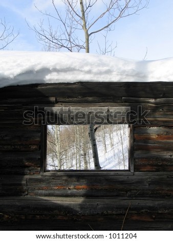 pioneer cabin in the snow