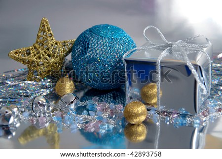 Beautiful still-life in blue, gold and silver tones, executed from New Year\'s attributes. It is devoted Christmas and New Year.