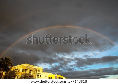 Colored Rainbow over a Cloudy Sky in Tenrife Canary Islands