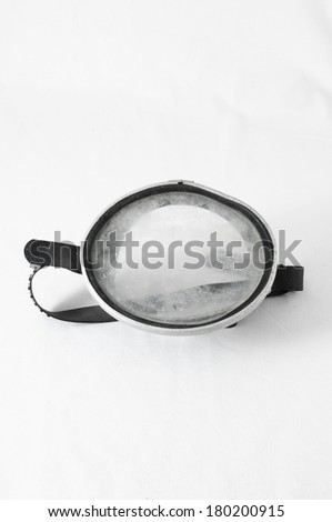 Old Vintage Dirty Diving Mask on a White Background