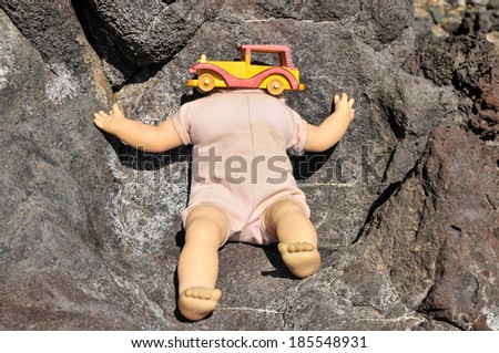 No Head Doll on the Volcanic Rocks