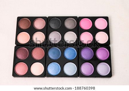 Make-up Palette Of Colorfully Eyeshadows Over White Background