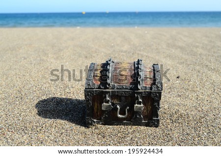Old Classic Wood and Iron Treasure Chest on the Beach