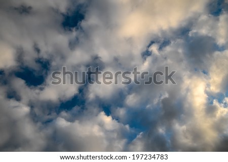 Cloudscape, Colored Clouds at Sunset near the Ocean