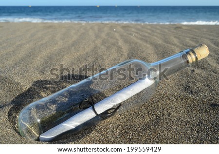 Message in a Bottle on the sand Beach