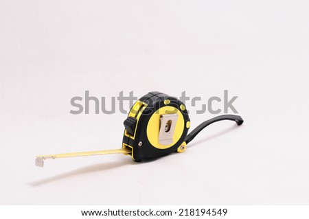 yellow tape measure isolated on white background