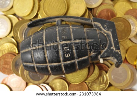 Money for War Concept Hand Grenade and Money
