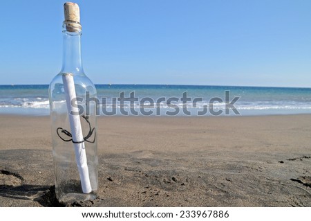 Message in a bottle on a lonely beach ,in Tenerife, Spain