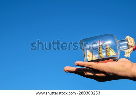Sailing Boat Vintage Vessel on a Caucasian Hand