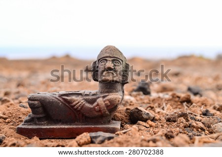Ancient Maya Statue on the Rocks Desert