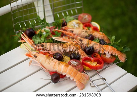 Lobsters with cherry and vegetables for barbecue