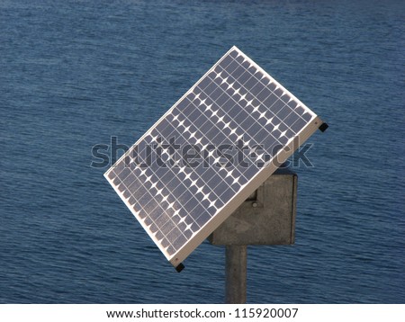 Solar Power Panel on Post against Sea