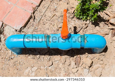 blue pvc pipe connection with valve