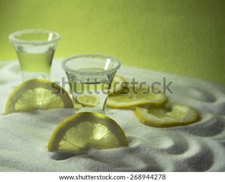 Tequila silver with circles and semi-circles of lemon on a salt