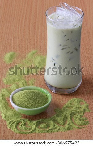 Green tea smoothie and matcha. Focus is on the matcha