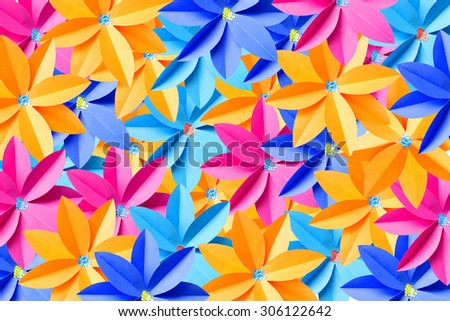 Recycle paper colored flowers seamless background with bright light