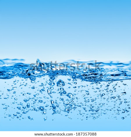 Blue water and air bubbles in the pool over white background with space for text