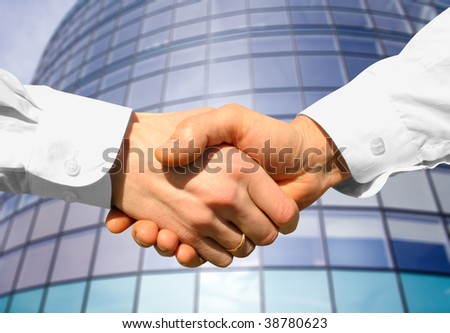 Businessman teamwork partners shaking hands