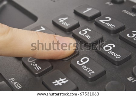 office black telephone with hand isolated on white