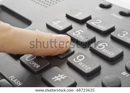 office black telephone with hand isolated on white