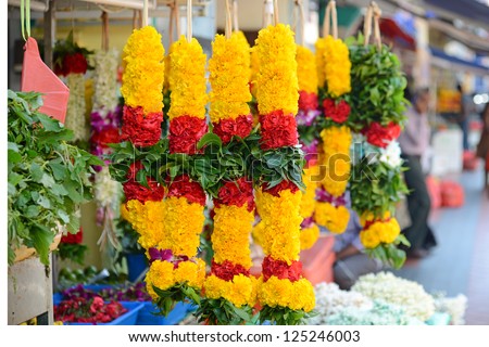 A Stall Selling Fresh Flower Garlands For Prayer