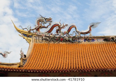 Dragon Design On The Eave Of A Chinese Temple