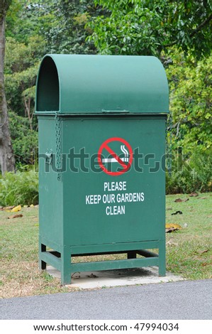 Green Garbage Bin In The Park